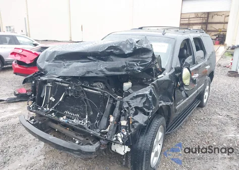 2011 Chevrolet Tahoe Ltz из США, поврежденный, VIN 1GNSCCE06BR104444